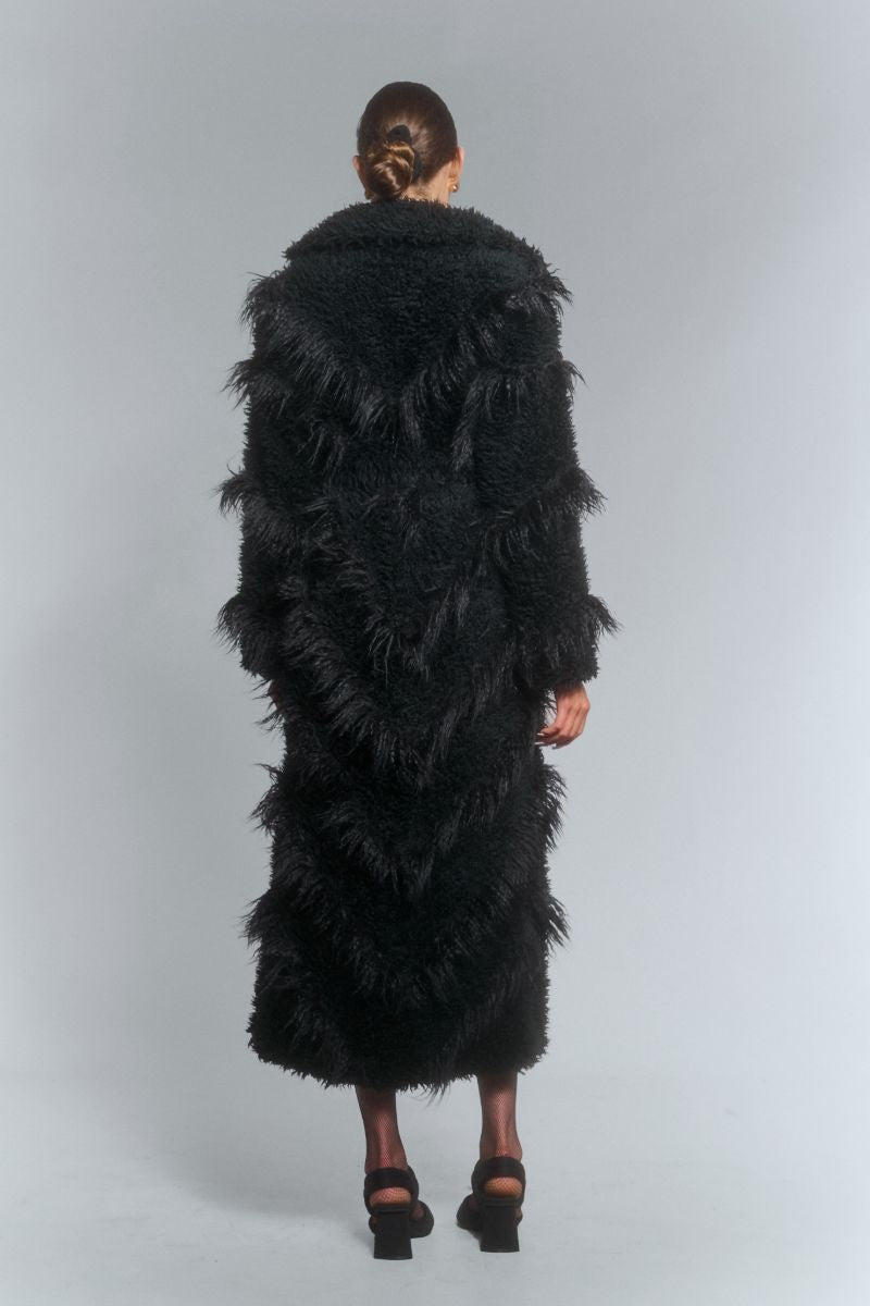 FAUX FUR MAXI COAT WITH DIAGONAL PANELS IN BLACK - CULT MIA