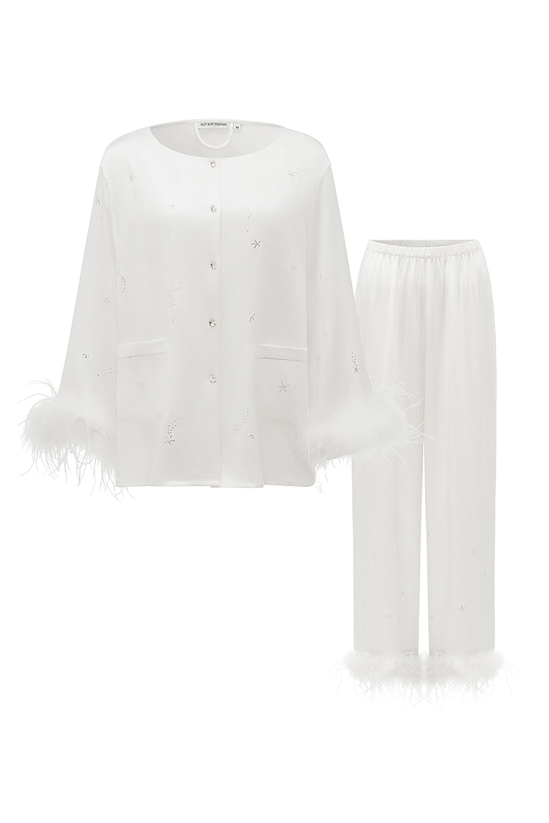 White feather long-sleeve pajamas set with rhinestones from Not Just Pajama, featuring feather details and a comfortable fit.
