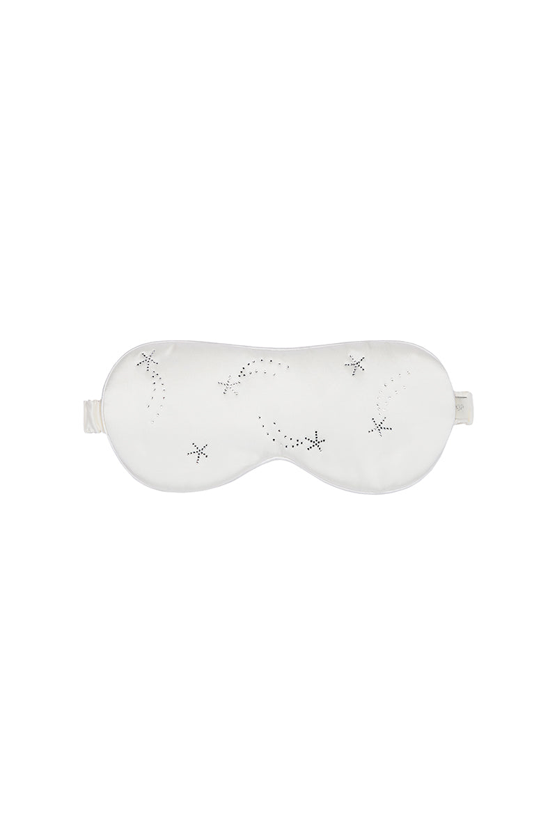 White and light purple rhinestone eye mask from Not Just Pajama, a stylish loungewear accessory for relaxing.