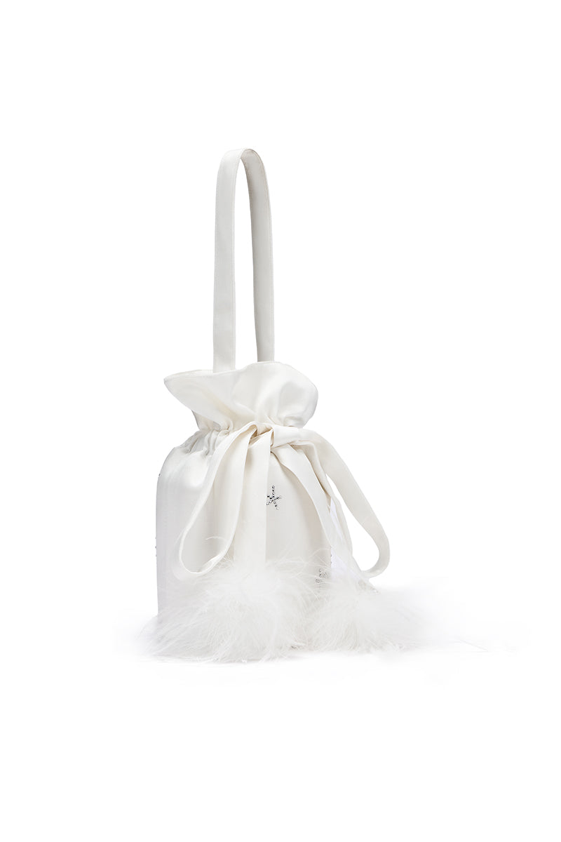 White top handle handbag by Not Just Pajama featuring rhinestones and feather embellishments for a stylish accessory.