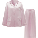 Pink plush trim long pajama set by Not Just Pajama, featuring cozy fabric and relaxed fit for comfortable sleepwear.