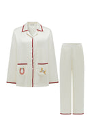 Pearl white contrast wave-trim long pajama set by Not Just Pajama, featuring soft fabric and stylish design.