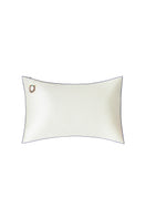Pearl white loungewear pillowcase from Not Just Pajama, soft fabric with smooth, elegant texture for comfortable sleep or relaxation.