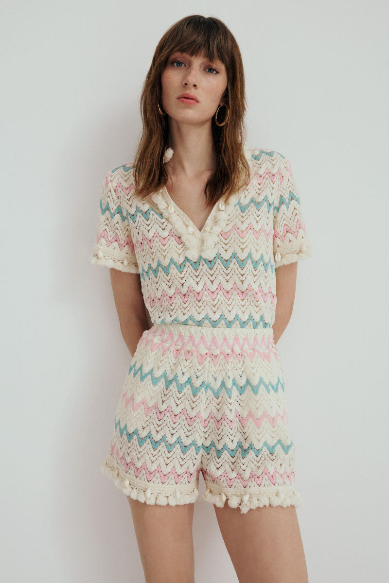 AISA Ruby shirt in vibrant red fabric, displayed flat with collar and button details visible.