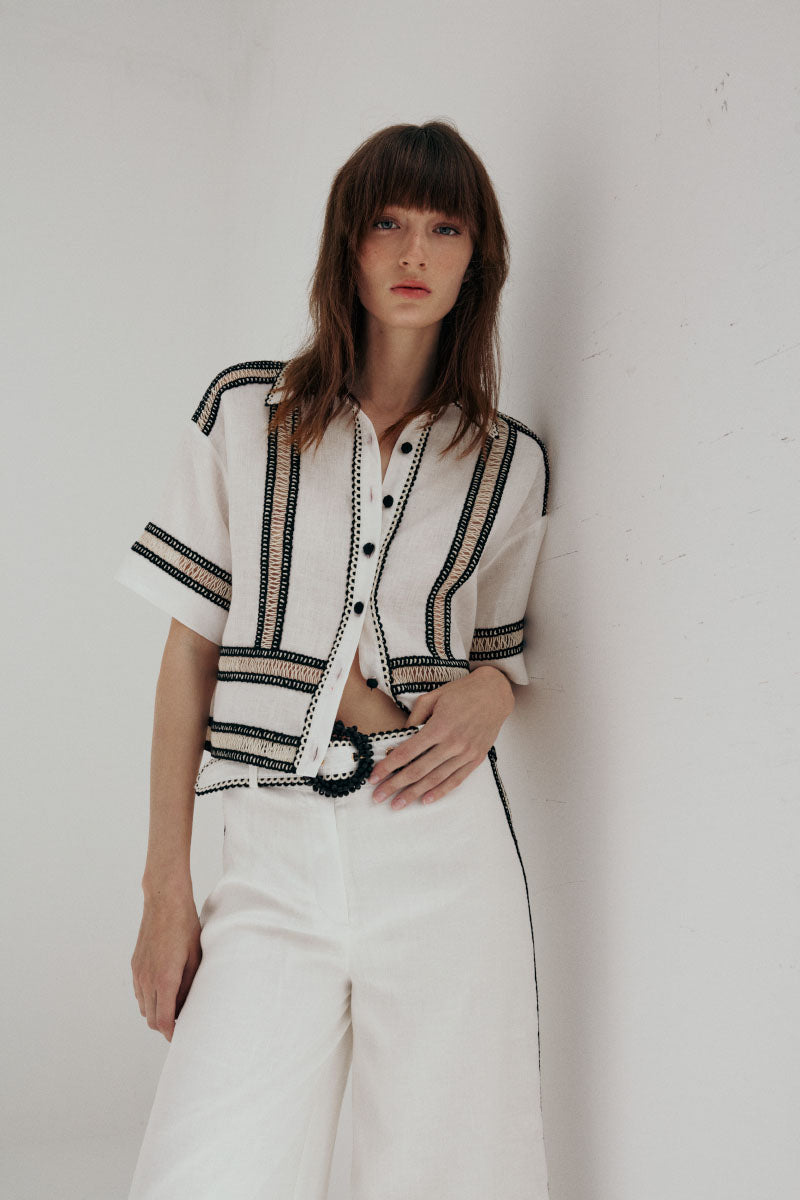 AISA Olivia pants in a stylish design, showcasing the front view with a relaxed fit and modern fabric texture.