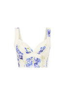 AISA FERYAL top in soft fabric with a stylish neckline, displayed on a hanger against a neutral background.