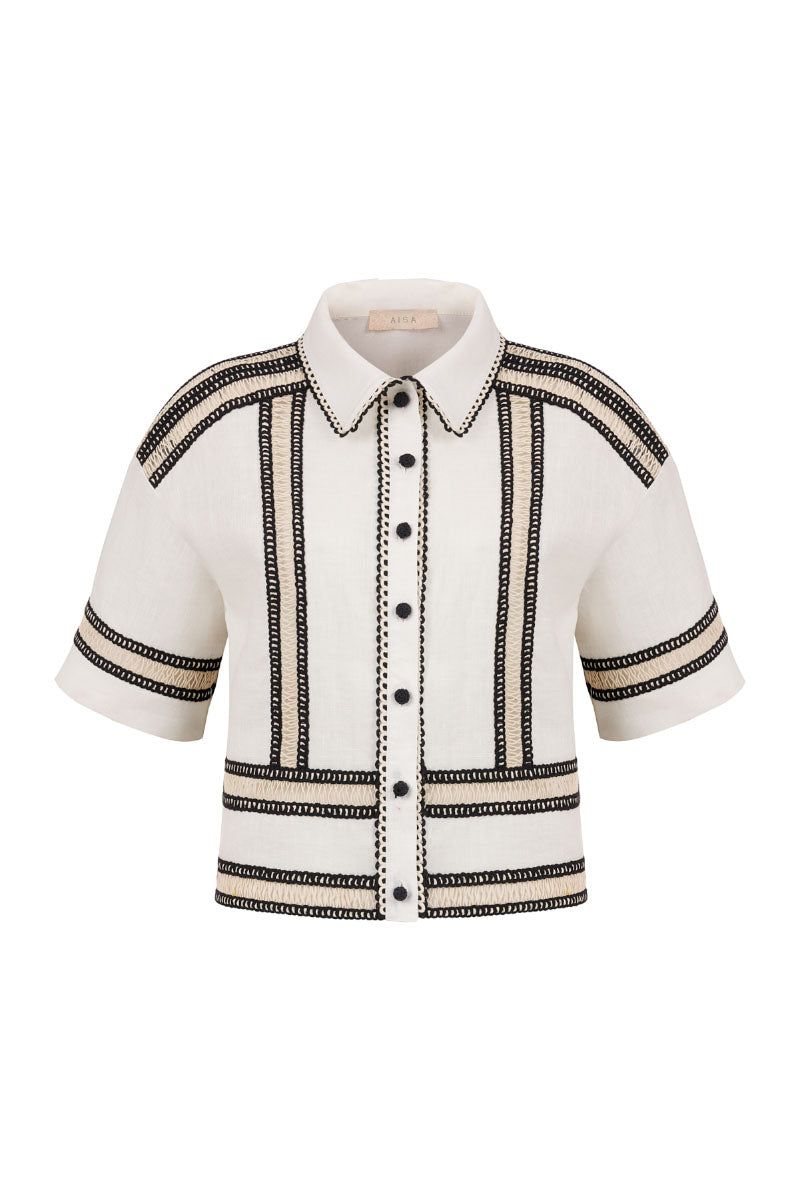 AISA Olivia shirt in soft fabric with a classic collar and button-down front, displayed on a hanger.