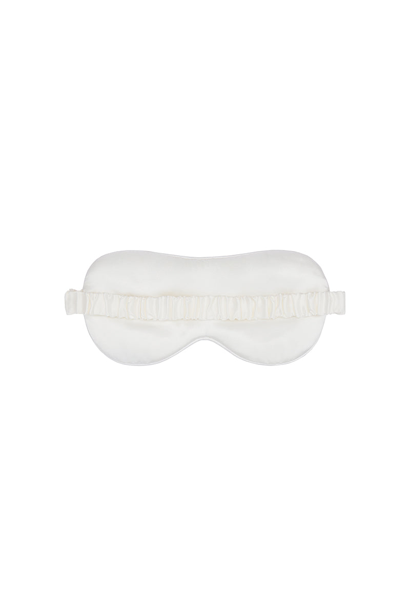 White and light purple rhinestone eye mask from Not Just Pajama, perfect for luxurious loungewear and relaxation.