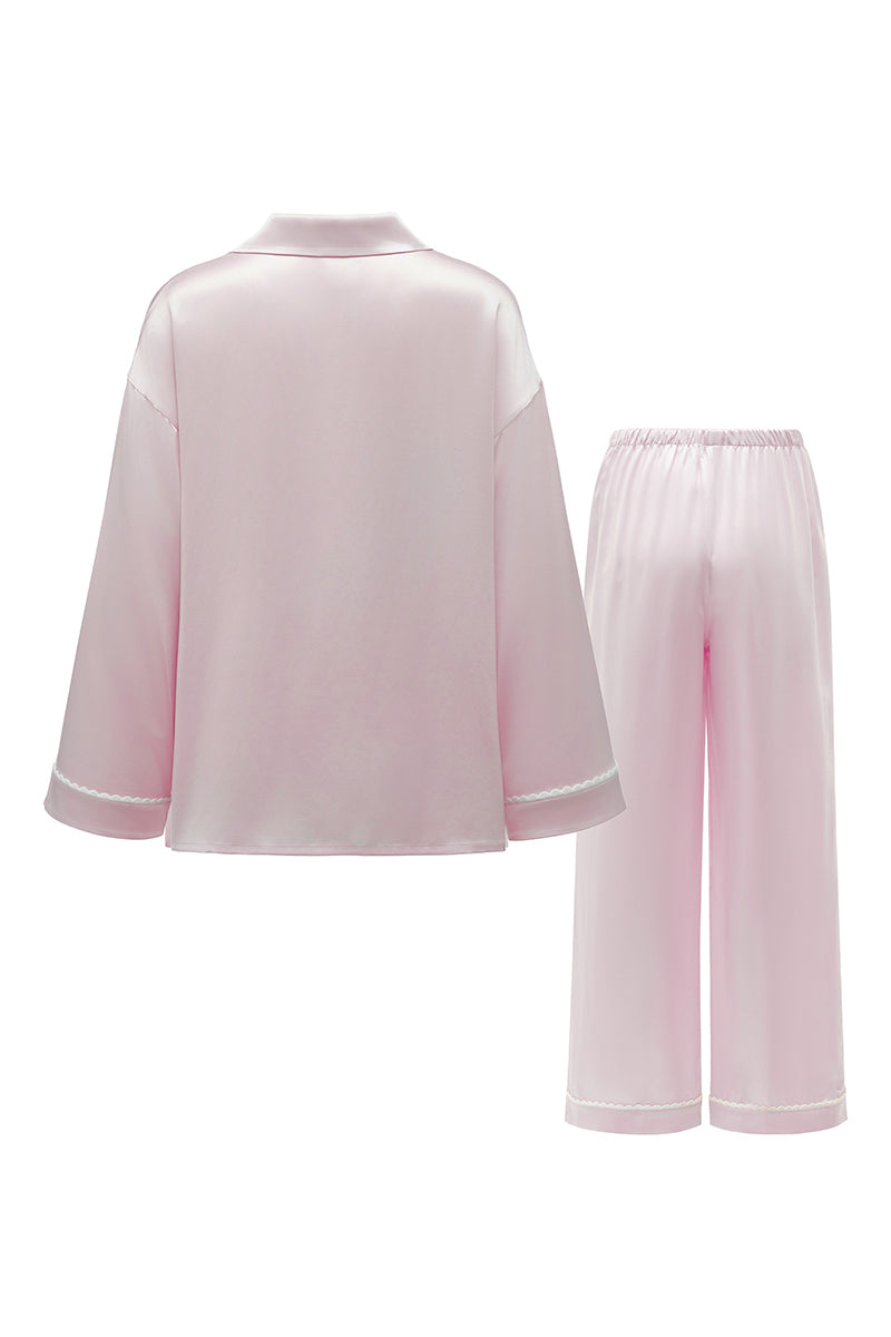 Pink plush trim long pajama set from Not Just Pajama featuring cozy fabric and relaxed fit.