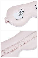 Pink eye mask from Not Just Pajama loungewear collection, soft fabric for relaxing rest and sleep.