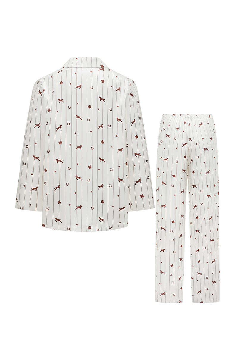 Unisex brown print twill pajama set with long sleeves and pants, made by Not Just Pajama, displayed flat on a white background.