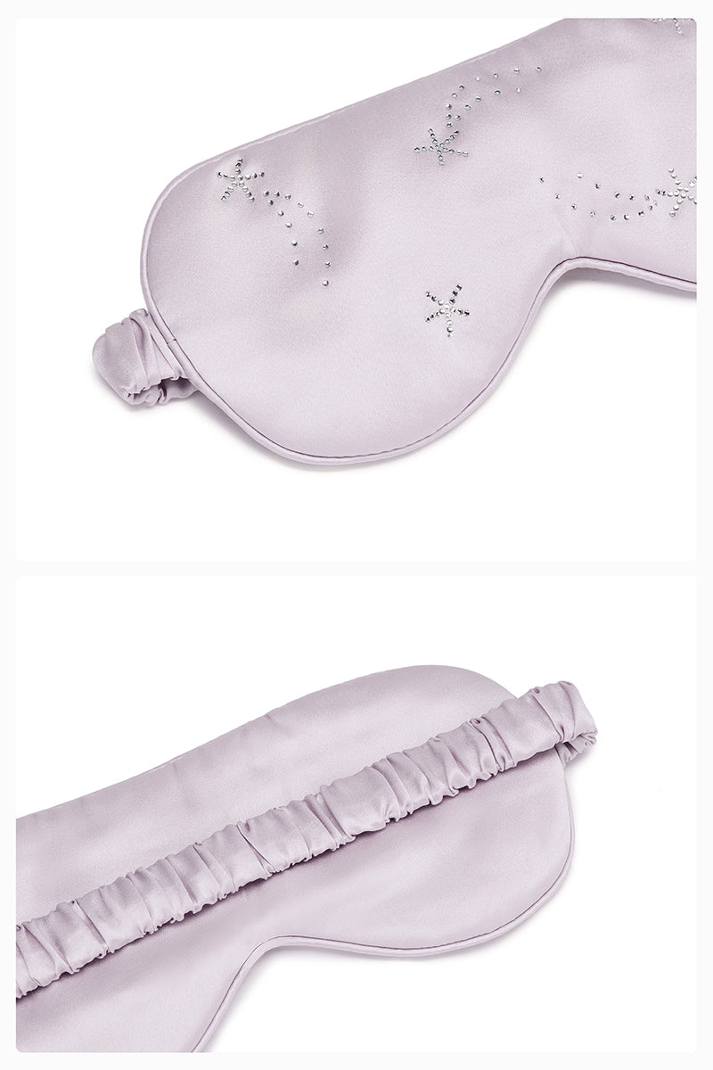 White and light purple rhinestone eye mask from Not Just Pajama, a stylish loungewear accessory with sparkling embellishments.