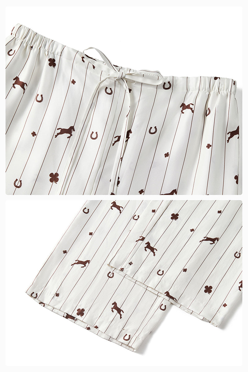 Unisex brown printed twill pajama long set from Not Just Pajama, featuring comfortable button-up top and matching pants.