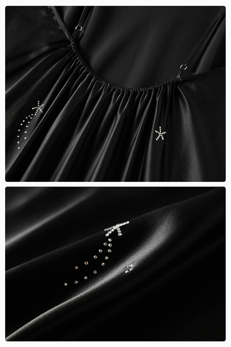 Black bias-cut slip dress with feather accents and rhinestones, featuring a maxi dress style from Not Just Pajama.