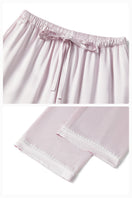 Pink plush trim long pajama set by Not Just Pajama, featuring cozy fabric and relaxed fit for comfortable sleepwear.
