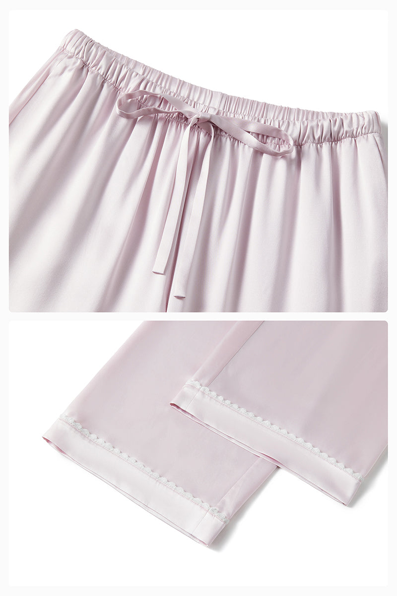 Pink plush trim long pajama set by Not Just Pajama, featuring cozy fabric and relaxed fit for comfortable sleepwear.