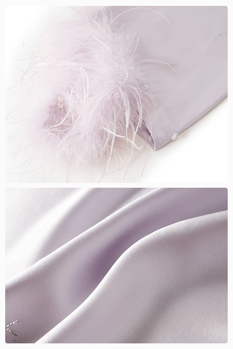 Light purple feather and rhinestone short robe from Not Just Pajama, featuring a stylish, elegant design with feather details.