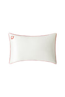 Pearl white loungewear pillowcase from Not Just Pajama, soft fabric with smooth finish, perfect for comfortable relaxation and sleep.