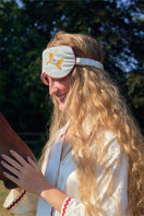 Pearl white embroidered eye mask from Not Just Pajama, a soft loungewear accessory with delicate embroidery for comfortable relaxation.