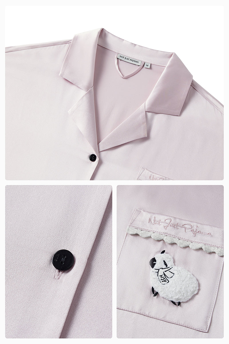 Pink plush trim long pajamas set by Not Just Pajama, featuring cozy fabric and relaxed fit for comfortable sleepwear.