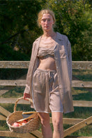 Brown plaid printed bandeau top and matching shorts pajama set by Not Just Pajama, featuring a comfortable, relaxed fit.