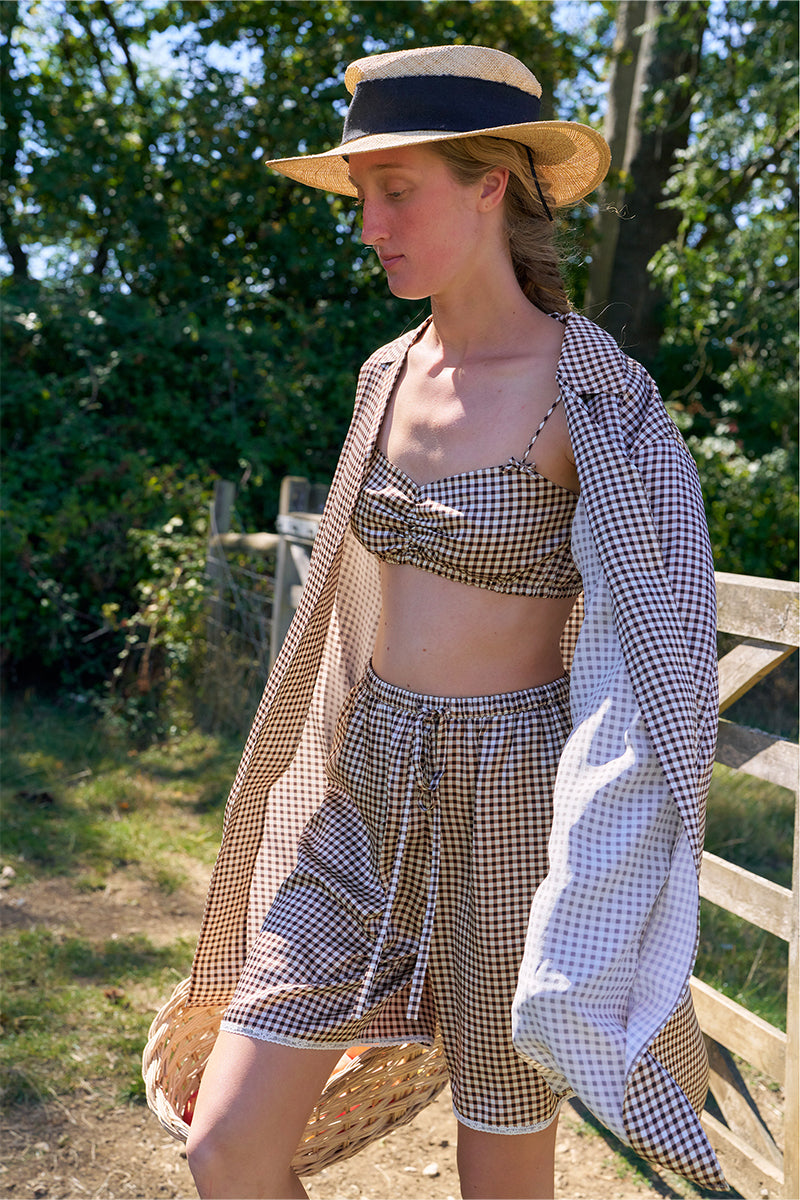 Brown plaid printed bandeau top and shorts set from Not Just Pajama, comfortable pajama ensemble with matching print.