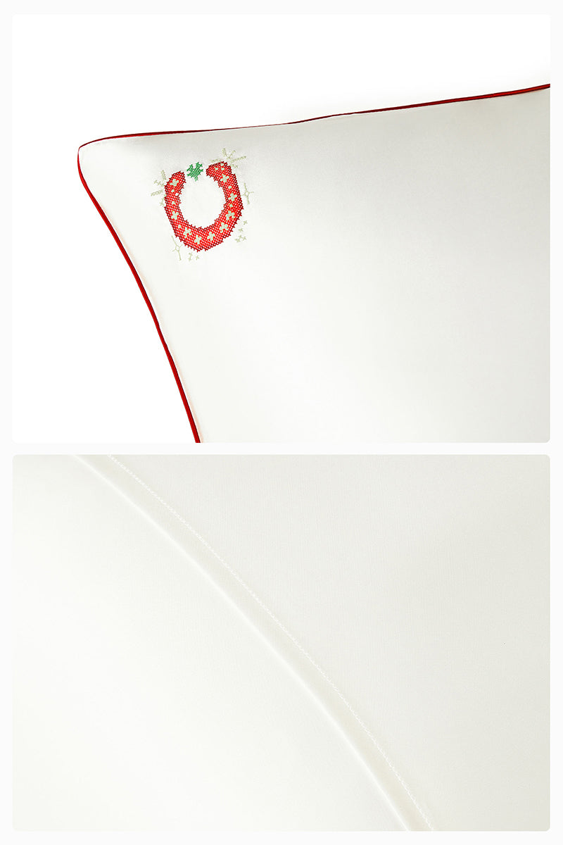 Pearl white loungewear pillowcase from Not Just Pajama, soft fabric with a smooth, elegant finish.