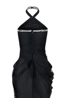 Black halter neck chiffon maxi dress by CEM featuring a flowing silhouette and elegant design, perfect for formal occasions.