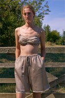 Brown plaid printed bandeau top and matching shorts pajamas set by Not Just Pajama, featuring a casual, comfortable sleepwear design.