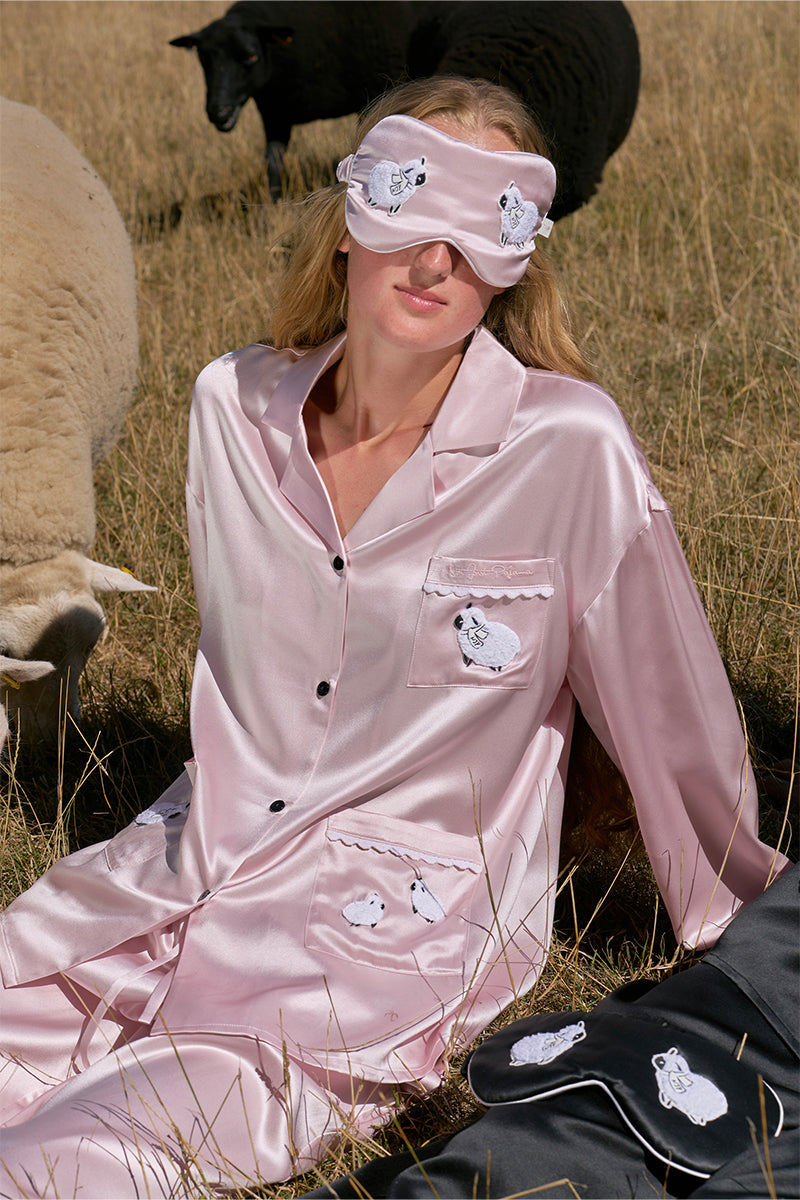 Pink plush trim long pajama set from Not Just Pajama featuring soft fabric and cozy design.