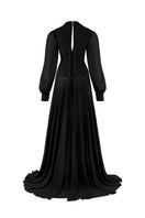 Black chiffon maxi gown with puffed sleeves and corset bodice by CEM, featuring elegant flowing fabric and a sophisticated design.