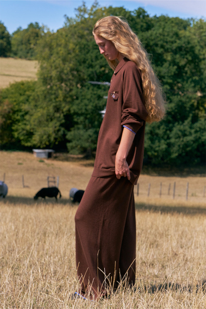 Unisex brown pants from Not Just Pajama, shown laid flat with waist and leg details for comfortable casual wear.