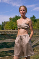 Brown plaid printed bandeau top and shorts set from Not Just Pajama, featuring a comfortable pajama style with a coordinated print.