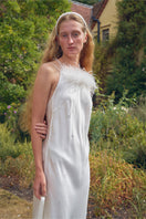 White bias-cut slip dress with rhinestones and feather details, by Not Just Pajama, featuring elegant feather accents and a flattering maxi length.