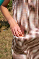 Brown plaid printed sleeveless midi dress from Not Just Pajama featuring a relaxed fit and stylish design.