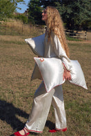 Pearl white loungewear pillowcase from Not Just Pajama, soft and smooth fabric for comfortable sleep and relaxation.