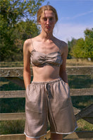 Brown plaid printed bandeau top and shorts set by Not Just Pajama, featuring a comfortable pajama design with matching print.