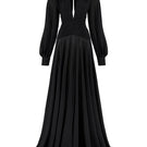 Black chiffon gown with puffed sleeves and a fitted corset style from CEM, featuring a flowing maxi length and elegant design.