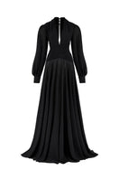 Black chiffon gown with puffed sleeves and a fitted corset style from CEM, featuring a flowing maxi length and elegant design.