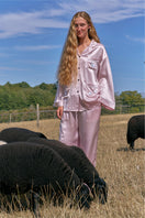 Pink plush trim long pajamas set by Not Just Pajama, featuring soft fabric and cozy design for comfortable sleepwear.