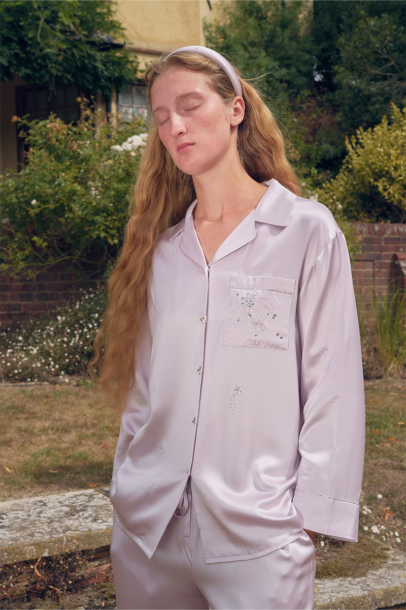 Light purple rhinestone long pajama set by Not Just Pajama, featuring comfortable fabric and sparkling rhinestone embellishments.