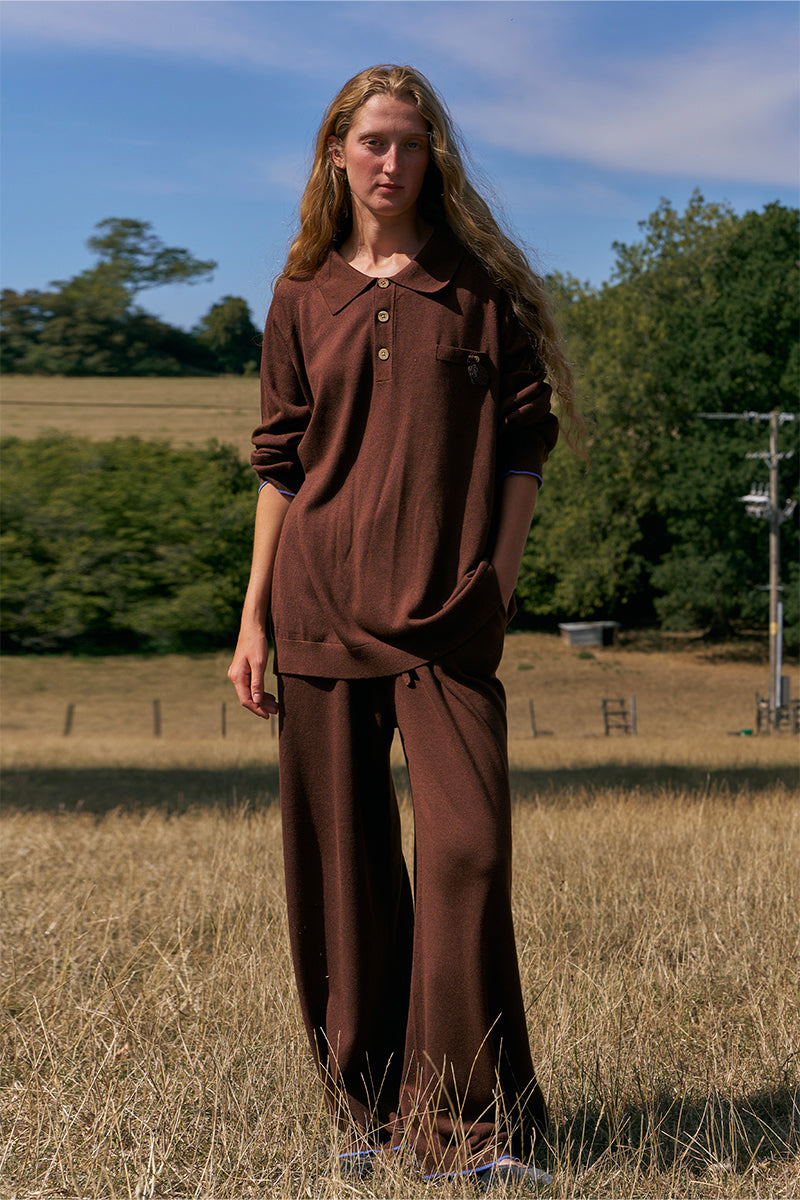 Unisex brown long sleeve knitwear shirt from Not Just Pajama, showcasing a cozy, fitted knit fabric and classic collar design.