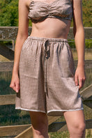 Brown plaid printed bandeau top and matching shorts pajamas by Not Just Pajama, featuring comfortable sleepwear design.