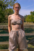 Brown plaid printed bandeau top and matching shorts set from Not Just Pajama, casual pajamas for comfortable lounging.