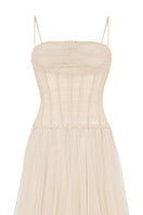 CEM nude sheer corset strap mesh maxi dress with floor-length design, featuring a fitted bodice and flowing skirt.