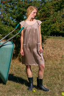 Brown plaid printed sleeveless midi dress by Not Just Pajama, featuring a stylish design and flowing silhouette.