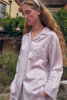 Light purple rhinestone long pajamas set from Not Just Pajama with sparkling embellishments and comfortable fabric.