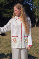 Pearl white Contrast Wave-Trim long pajamas set by Not Just Pajama, featuring wave-patterned trim and comfortable fabric.