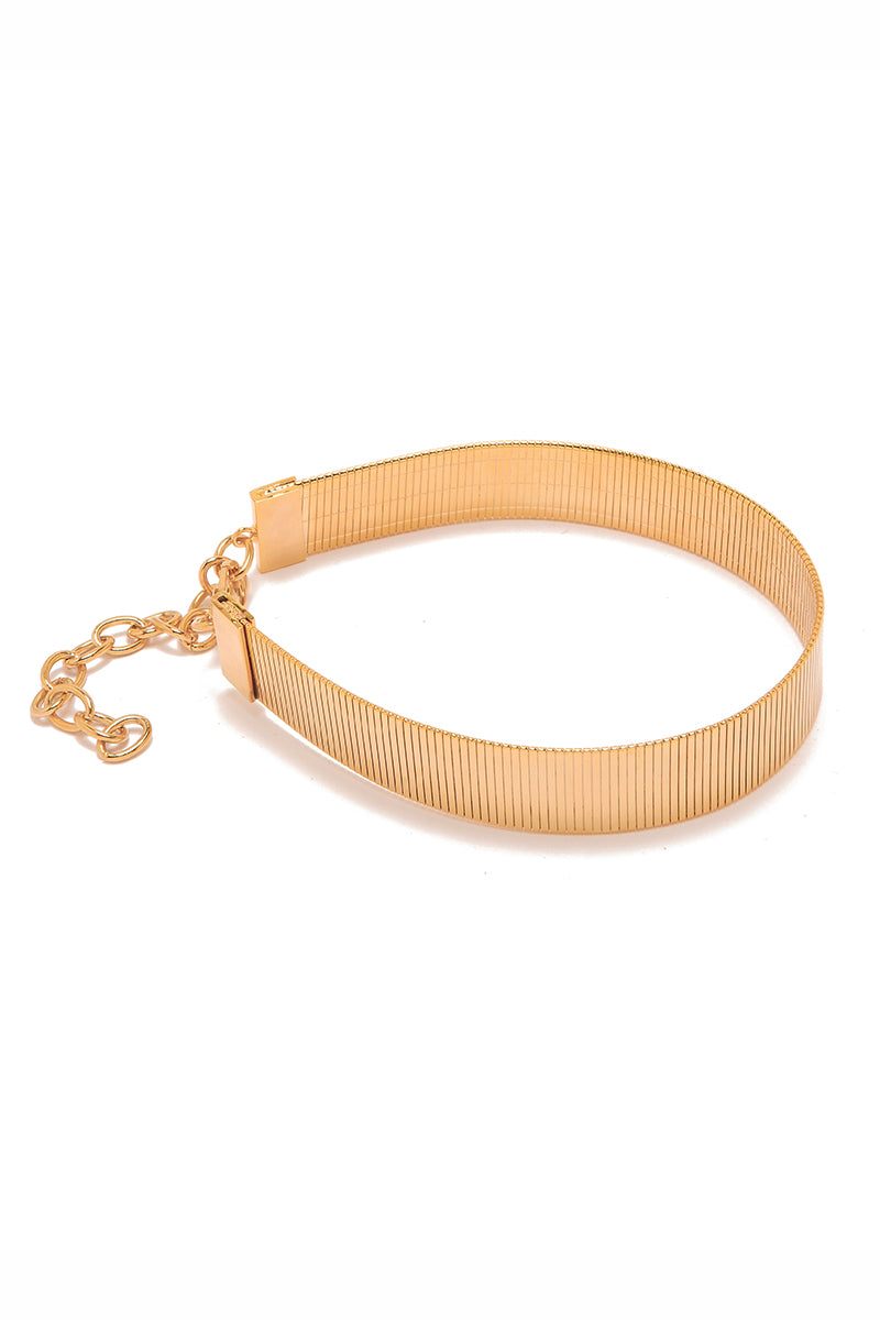 Gold ALISEE Choker Necklace by Silvia Gnecchi featuring a sleek, minimalist design with a smooth, shiny surface.