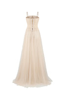 CEM nude sheer corset strap mesh maxi gown with floor-length design and elegant fitted silhouette.